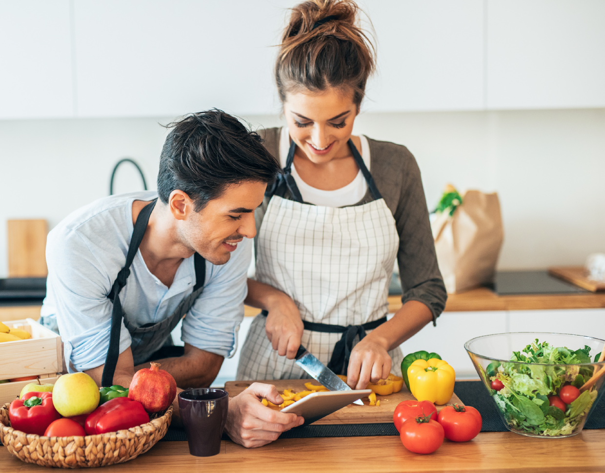 couple cooking a healthy meal for functional wellness gut health